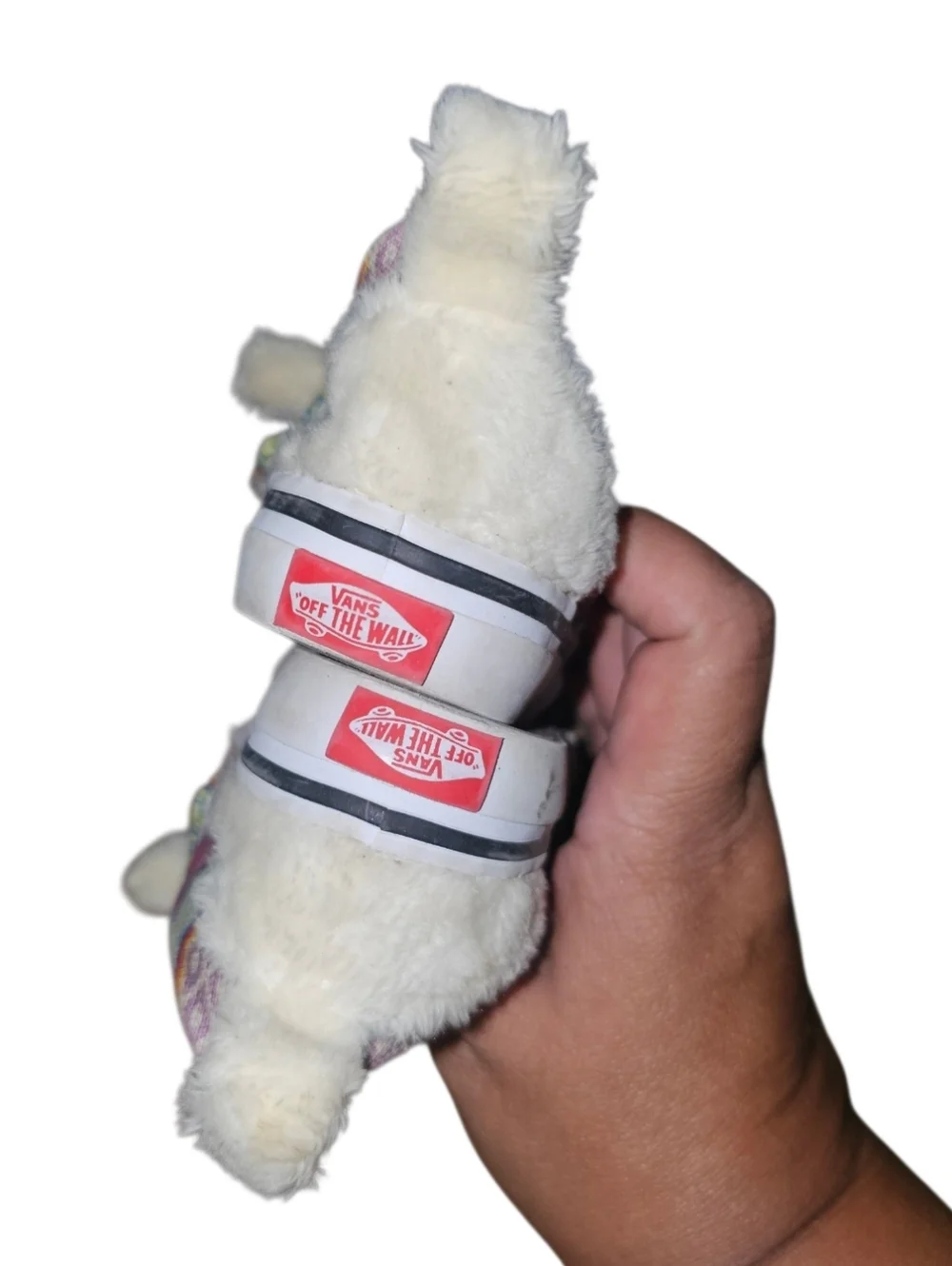Vans Slip-On V Alpaca sneakers featuring a faux fur llama design.